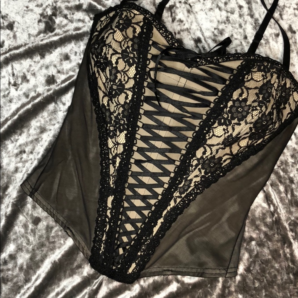 Flesh and black lace and mesh corset